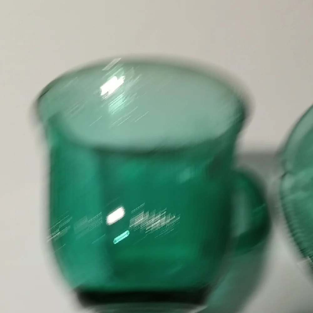 Green Glass Teacup and Saucer Set
